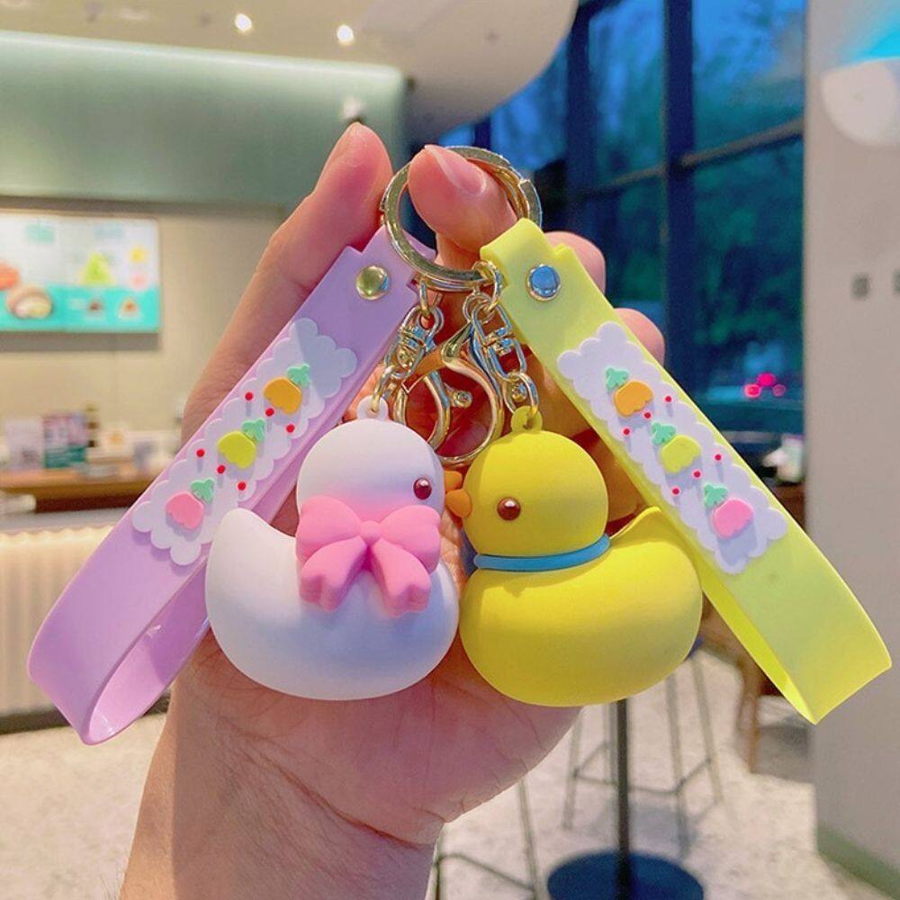 HUIHEYU Cute Exquisite Gifts Couple Car Key charms Doll Key Holder Backpack Pendant Bow Tie Duck Keychain Bag Ornaments Wristlet Keychain